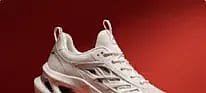 White sneaker on deep red