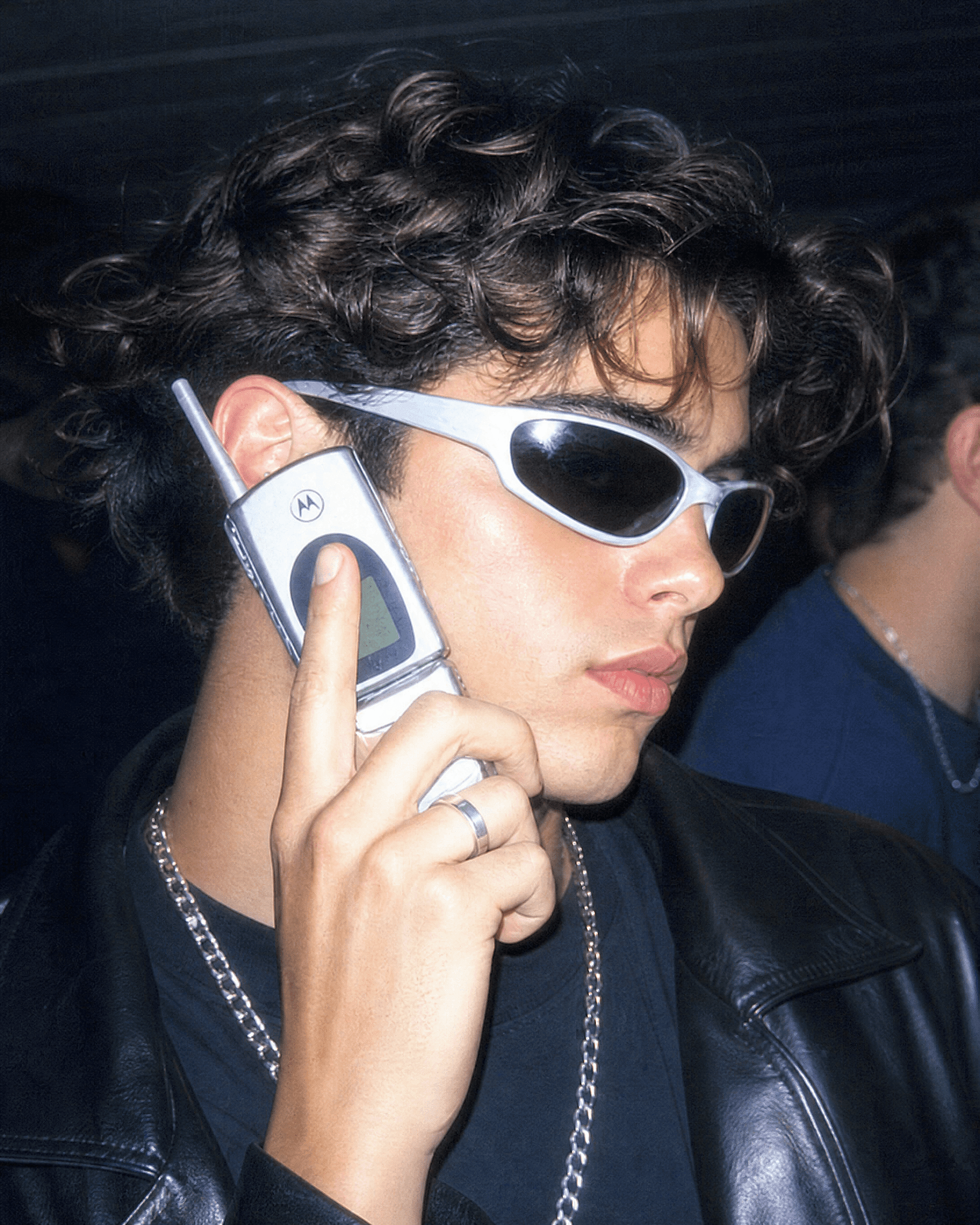 a modern selfie restyled into a Y2K early-2000s flash-photo look