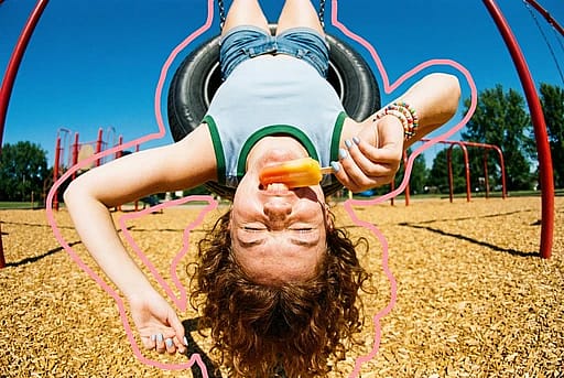 High-energy nostalgic 90s summer aesthetic with a playful avant-garde twist captured with a fisheye lens.