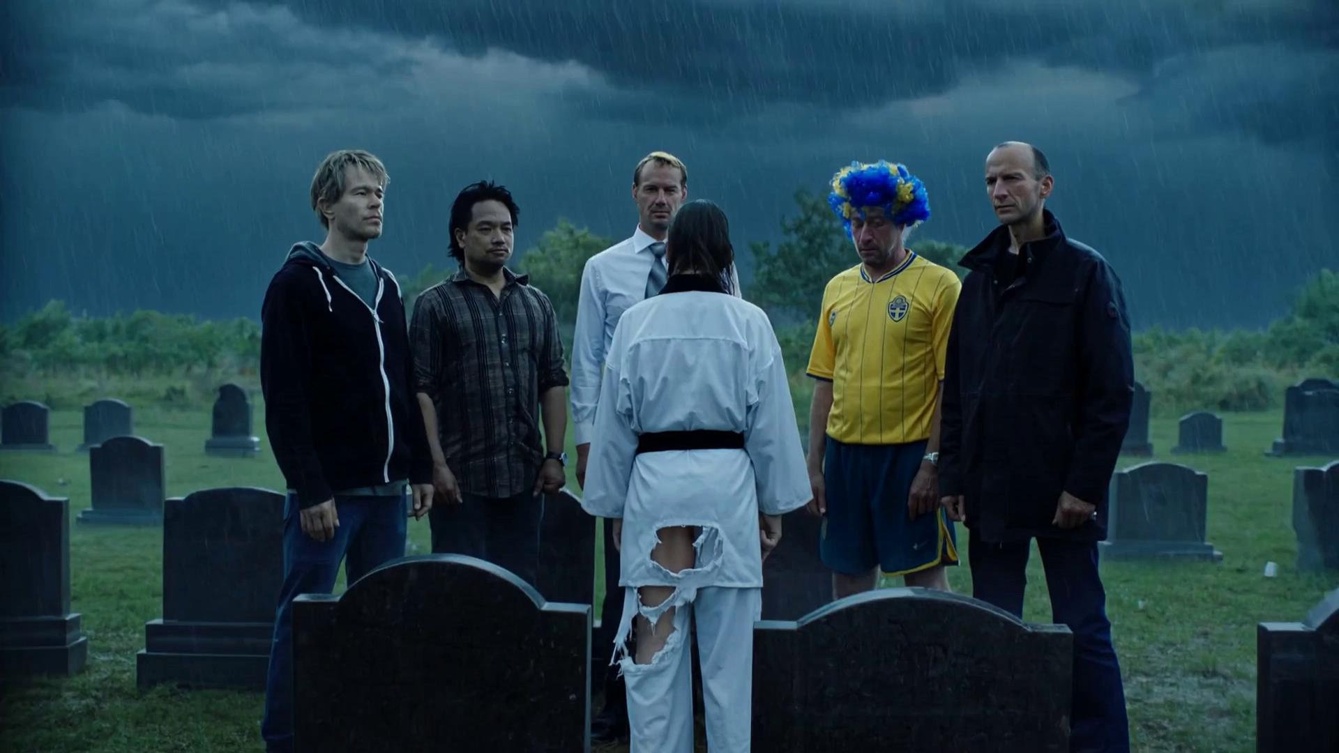 Prompt: We are at a funereal all the people in the images are standing around the grave.In front stands the character @Rene he is dressed in a karate uniform it is torn and ripped a part.Heavy rain, bluish light, lightning