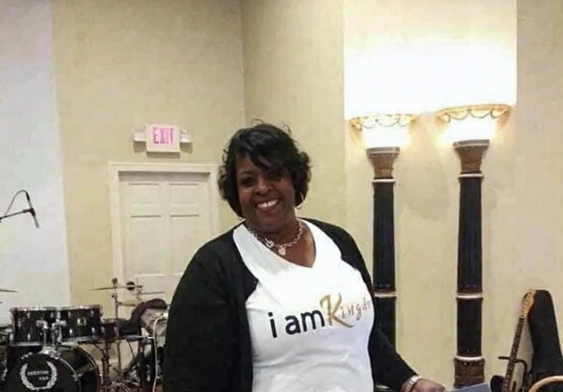 Prompt: A women standing about to give the church announcements