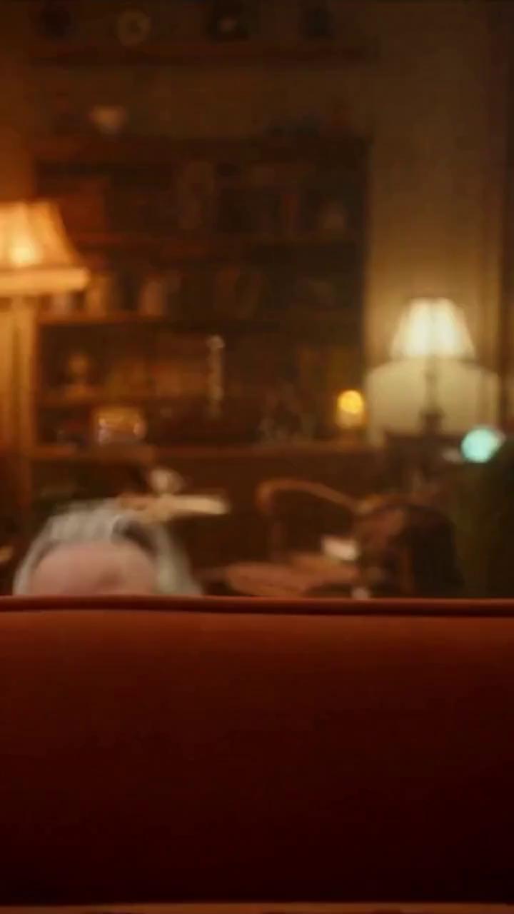 Prompt: A real life 15–20 second scene inside a large, cozy, slightly eccentric Dutch home. An elderly Dutch man with a theatrical, exaggerated Dutch accent gives a playful tour of his unusual cheese collection. The living room is filled with warm lamps, wooden furniture, retro 1970s décor, and quirky antiques. He enthusiastically presents a series of strange, handcrafted cheese sculptures: a cheese shaped like a human ear, a cheese shaped like the Eiffel Tower, a cheese shaped like a finger with a ring on it, and other oddities. He pops up unexpectedly from behind furniture — behind a couch, behind an armchair, behind a bookshelf, from behind a half-open door — each time holding a different cheese and explaining its “mysterious origins” with joyful, dramatic energy. He speaks in English with a thick, exaggerated Dutch accent, making the tone humorous and documentary-mockumentary-like. The sequence ends with him proudly holding his rarest cheese while the camera widens to reveal the entire living room overflowing with strange cheese art.

Photorealistic vertical tracking shot, camera panning and tracking movement, subject relatively sharp with subtle motion blur in his hands as he gestures, long-exposure background streaking and warm tungsten light trails, pronounced horizontal motion blur in the background, preserve original film grain and vintage color grade, high-detail skin, hair, wool sweater, wood textures, cheese textures, cinematic contrast, shallow depth of field, natural glass reflections, dynamic comedic gestures, editorial mood, high quality, ultra-detailed, no UI.

Negative prompt: no glitching, no warped faces, no extra limbs, no duplicate characters, no random people, no melting objects, no cheese deforming unnaturally, no chaotic motion, no fisheye lens, no neon colors, no futuristic elements, no jump cuts, no surreal distortions, no cartoon style, no 3D animation look, no watermarks, no subtitles, no on-screen text, no stock-footage feel, no UI overlays, no camera shake, no sudden lighting shifts.