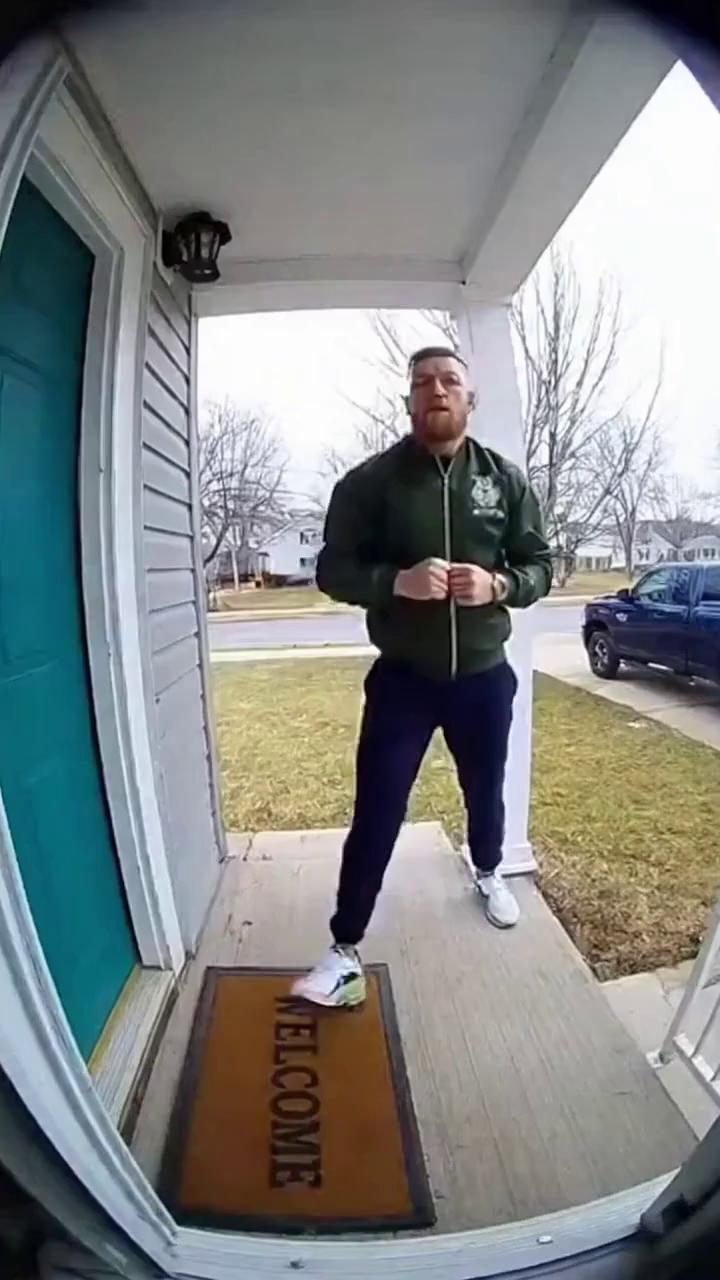 Prompt: 6. Conor McGregor – Trash Talk Mode
View: Amazon Ring Security Camera

Setup:
Conor-style character struts up confidently.

Build:

“Who the fook lives here?”

Shadow boxes the air.

Escalation:
Points at camera:

“I run this door.”

Funny Ending:
Trips over the welcome mat.
Gets up immediately:

“Planned.”
Walks off.