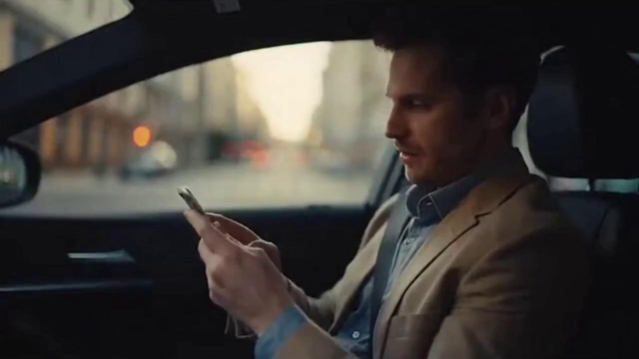 Prompt: "Cinematic shot, late afternoon golden hour lighting. Interior car POV looking through driver's side window. A person in business casual attire sits in the driver's seat of a modern sedan, hands holding a silver smartphone at chest level, scrolling. The car is stationary at a red traffic light. Shallow depth of field, bokeh background showing blurred city street.
Suddenly, a figure wearing a dark gray hoodie enters frame from the left side, approaching the partially open driver's window. The hooded figure's face is obscured by shadows. Their right arm extends quickly through the window opening in a swift, deliberate motion. Their hand grabs the smartphone from the driver's hands. The driver recoils in shock, eyes widening, mouth opening. The hooded figure pulls the smartphone out through the window and immediately exits frame left in a running motion.
Camera angle: Medium shot, 50mm focal length, eye level from passenger seat perspective. Realistic motion blur on the thief's movements. Natural lighting with slight underexposure for dramatic effect. Urban soundscape: distant traffic, sudden gasp from driver. Duration: 8-12 seconds. Photorealistic, high detail, 24fps cinematic quality."