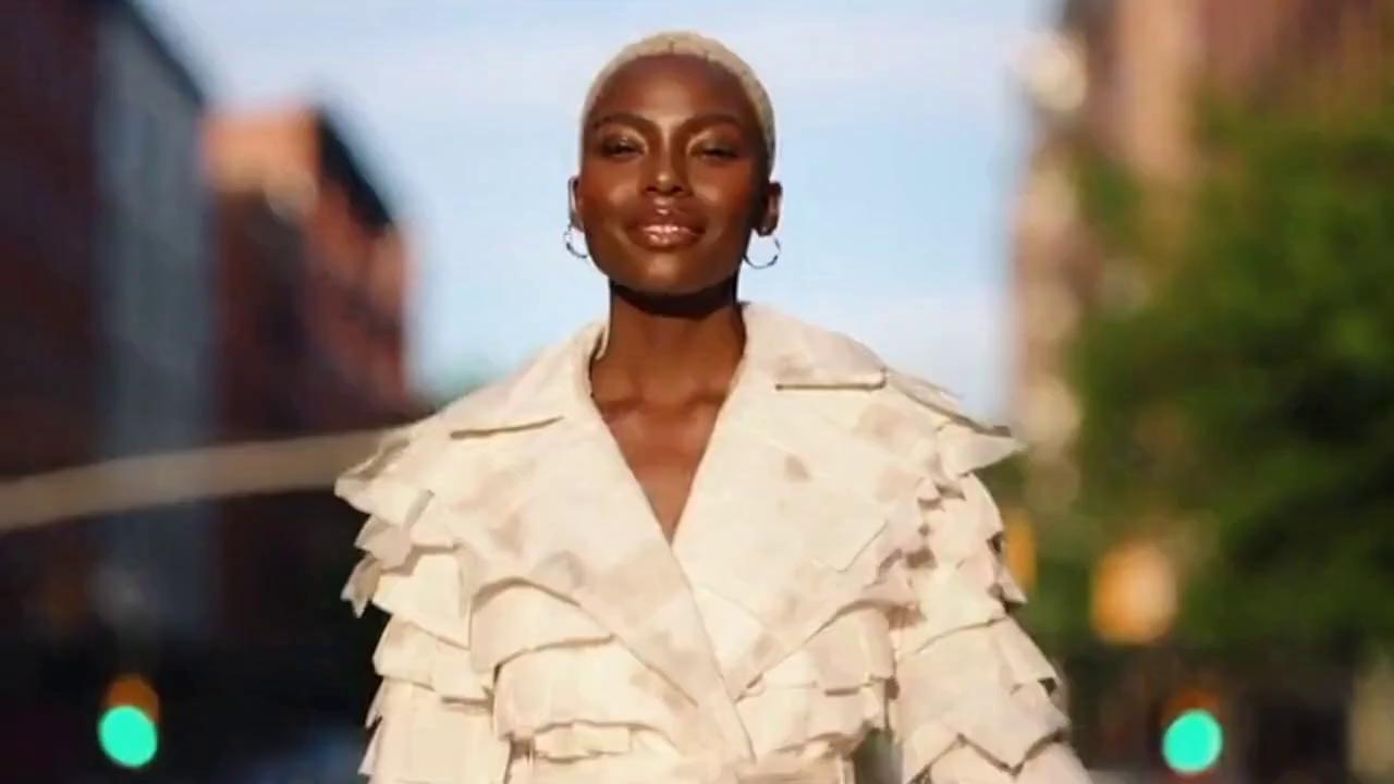 Prompt: A television advertisement for a brand of clothing called “Wiped”, made completely of used toilet paper.