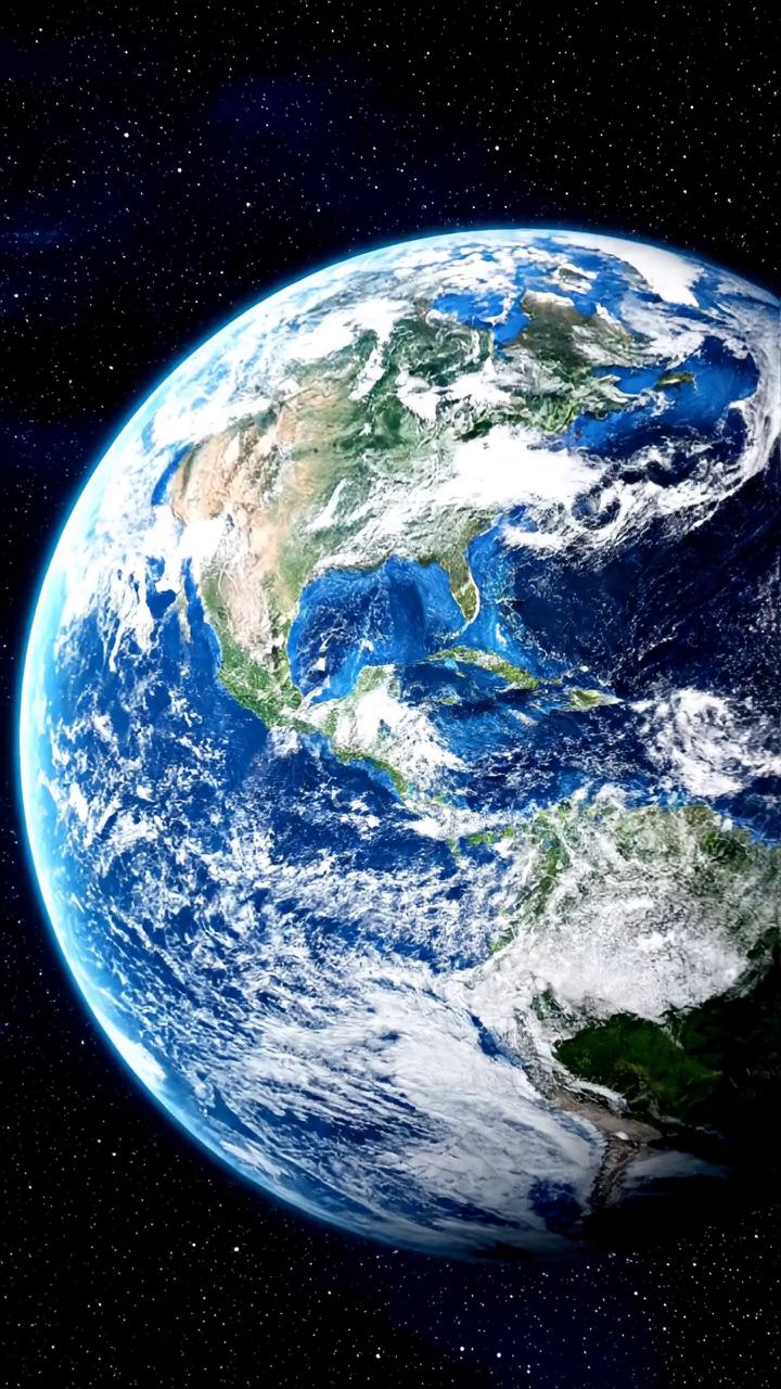 Prompt: Start the video in space showing the earth, then slowly zoom in past the clouds towards the land and finally onto a Caribbean beach where a monkey sticks his middle finger up at the camera 