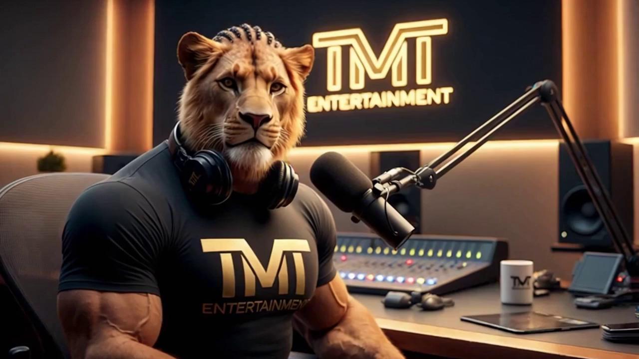 Prompt: create 3d pictures of a lion in a muscular man's body sitting in a modern radio studio. he is wearing a black t-shirt with TMT Entertainment on it. On the walls are signs that say TMT Entertainment in bright gold neon letters. his hair and face are braided in corn rolls. the lion will say, "hello I'm Dakarai, 
you are tune in to the pride with TMT Entertainment. I got a lot of new content coming your ways soon. Share, like, and join email list". 