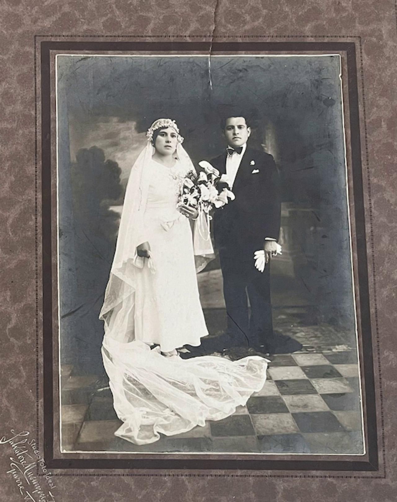 Prompt: Couple walks toward camera a in celebratory way