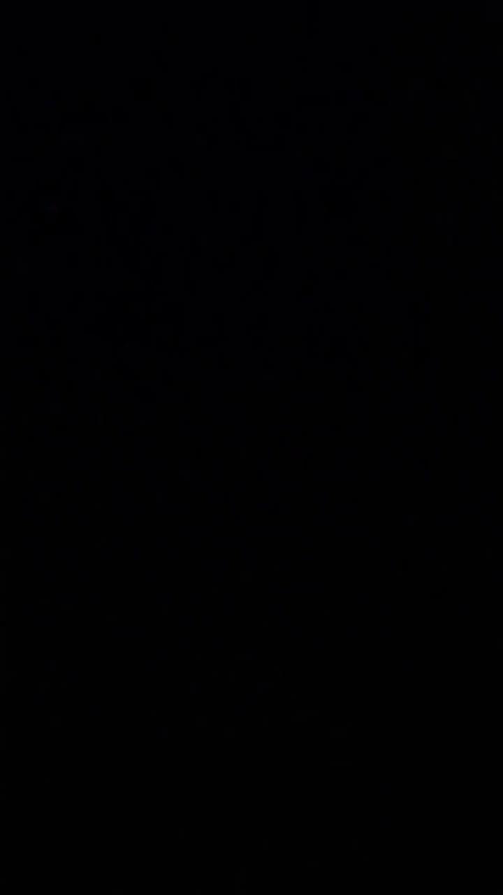 Prompt: Vertical video, 9:16, ultra-clean anime football style, minimalist, high contrast, designed for instant replay.

0–1s: Black screen → stadium lights snap on. Football drops into frame. Text flash (0.3s): “MESSI vs RONALDO”.

1–3s: Hard split screen.
Left: short, agile anime striker, blue aura, rapid foot taps, defenders reduced to motion silhouettes.
Right: tall, powerful anime striker, red aura, single explosive stride, ground cracks once.

3–5s: Two shots only (no montage):
• Blue energy curl shot bending unrealistically into goal
• Red power strike ripping through the air

5–6.5s: Smash cut to eye close-ups. Blue vs red energy collide at center frame. Screen vibrates.

6.5–7s: Freeze-frame clash → instant cut to black for seamless loop.