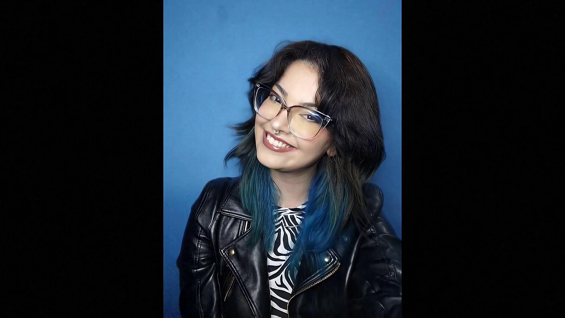 Prompt: Animate this image with the individual in this image receiving a "2025 Champion" Medal