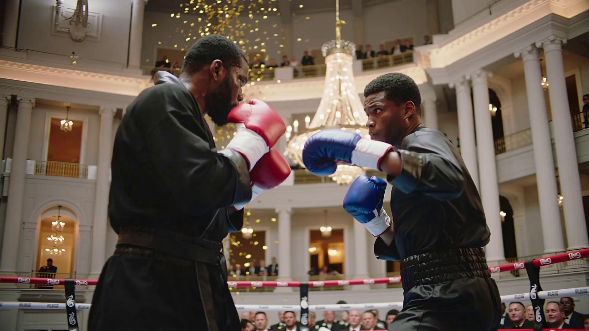 Prompt: A cinematic ultra-realistic 4K video of a dramatic boxing match between two fictional world leaders — the Eastern Republic champion and the Western Alliance contender — inside a grand white palace inspired by the White House.
The ring stands in the center of a luxurious marble hall with golden lights, chandeliers, and cheering audience.
Both fighters wear elegant boxing robes, red and blue gloves, sweat shining under the lights. The camera circles around them as they exchange powerful punches in slow motion.
The Eastern Republic fighter lands a final, decisive hit — the opponent falls back dramatically in ultra-slow motion. The crowd erupts in applause as golden confetti rains from above and the referee raises the winner’s hand.
Shot on a 35mm lens, cinematic lighting, realistic motion blur, shallow depth of field, photorealistic details, intense atmosphere, epic soundtrack.