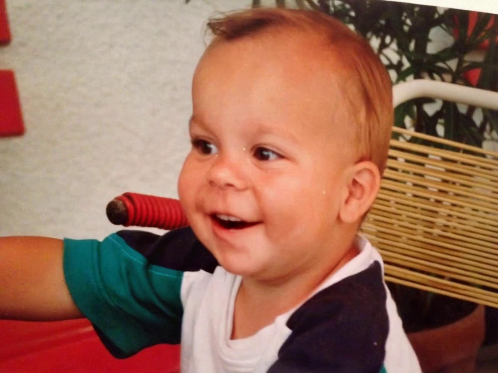 Prompt: A cute toddler sitting on a toy bike, holding a colorful toy gun like a microphone, passionately rapping into it with a big smile. The baby wears a tiny retro streetwear outfit, surrounded by floating cartoon music notes and toy bling chains. The camera zooms in rhythmically to the beat. In the background, there’s a cardboard ‘ghetto blaster’ and plush toys nodding their heads to the beat. Style: playful hip-hop parody, Pixar-style lighting, 4K resolution, vibrant colors.”