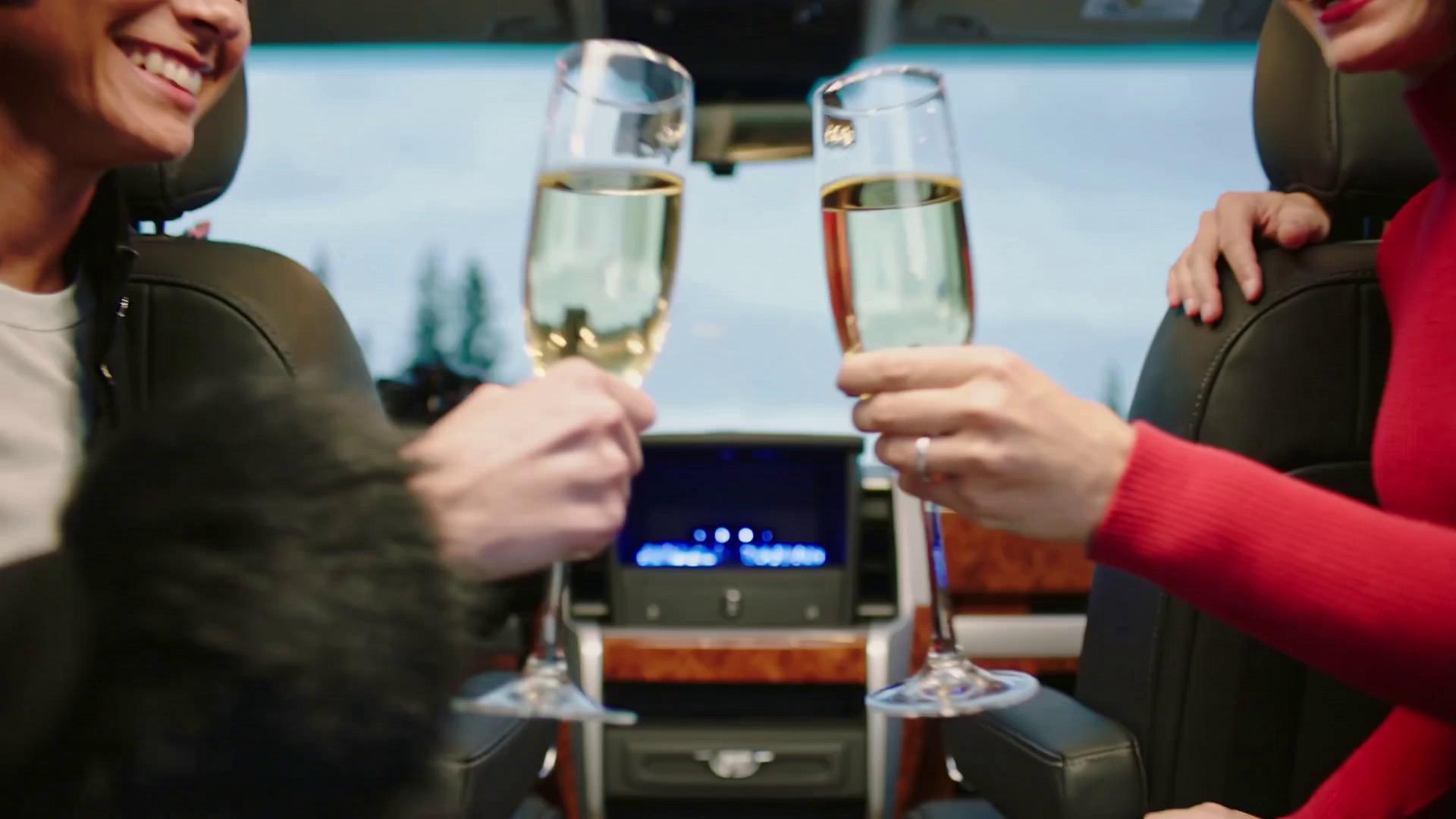 Prompt: Create a high-energy, celebratory 30-second spot for Aspen Luxury Black Car Service. The mood is vibrant, celebratory, and affluent. The focus is on a group of friends (two couples or a small party) dressed in formal or stylish ski-chic attire. The journey is not just transport; it's the pre-game. Show champagne flutes clinking gently inside the car (emphasizing the smooth ride), happy smiles, and the group laughing as they head to a dazzling, upscale event (e.g., a gala, an exclusive restaurant opening, or a New Year's Eve party). Use dynamic, hand-held or Steadicam shots that feel exciting and engaging. The vehicle (a Cadillac Escalade or large SUV) is presented as a mobile luxury lounge.

Key Details: The soundtrack should be a lively, sophisticated remix or modern EDM track that builds energy. The final scene shows the group making a grand entrance. The concluding title card is: "Aspen Luxury Black Car Service. The Journey is the Occasion."
Key Details: The music is a sharp, modern electronic or minimal techno track with a strong, precise beat. The tone is less "romantic luxury" and more "military-grade logistical perfection." The final card reads: "Aspen Luxury Black Car Service. Reliability, Redefined."