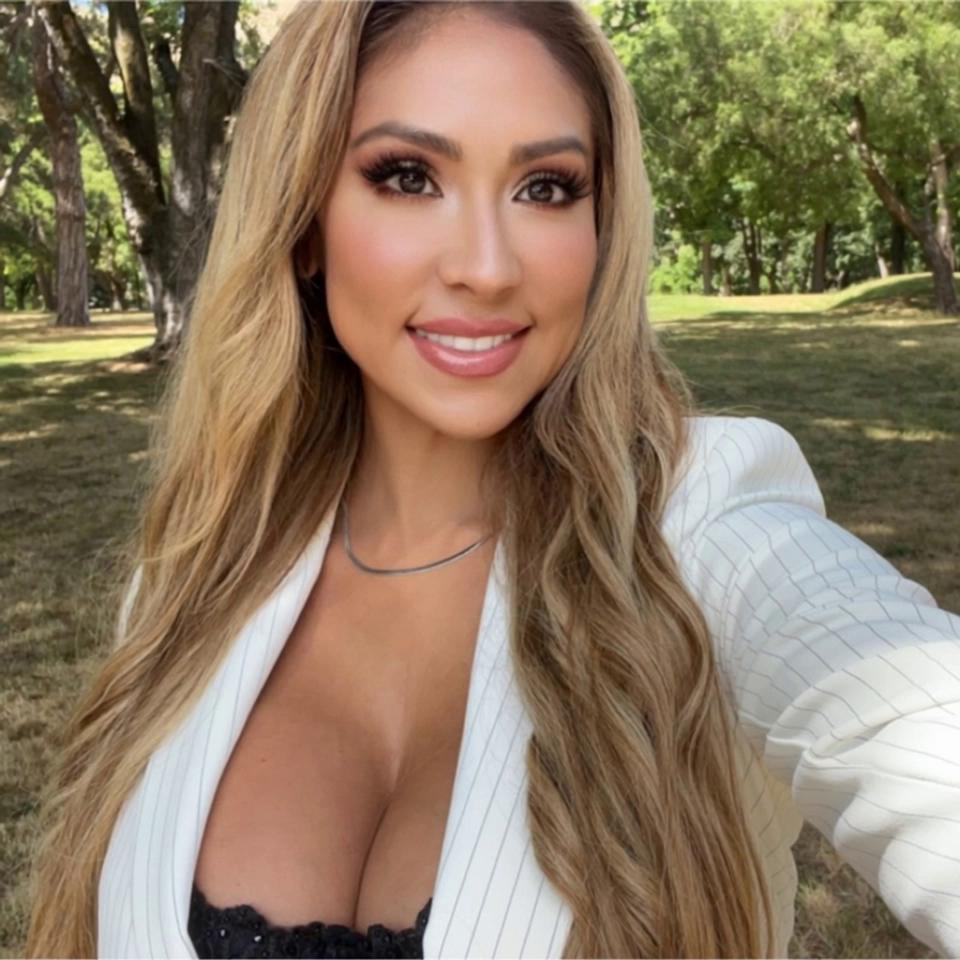 Prompt: native american woman taking blazer off
