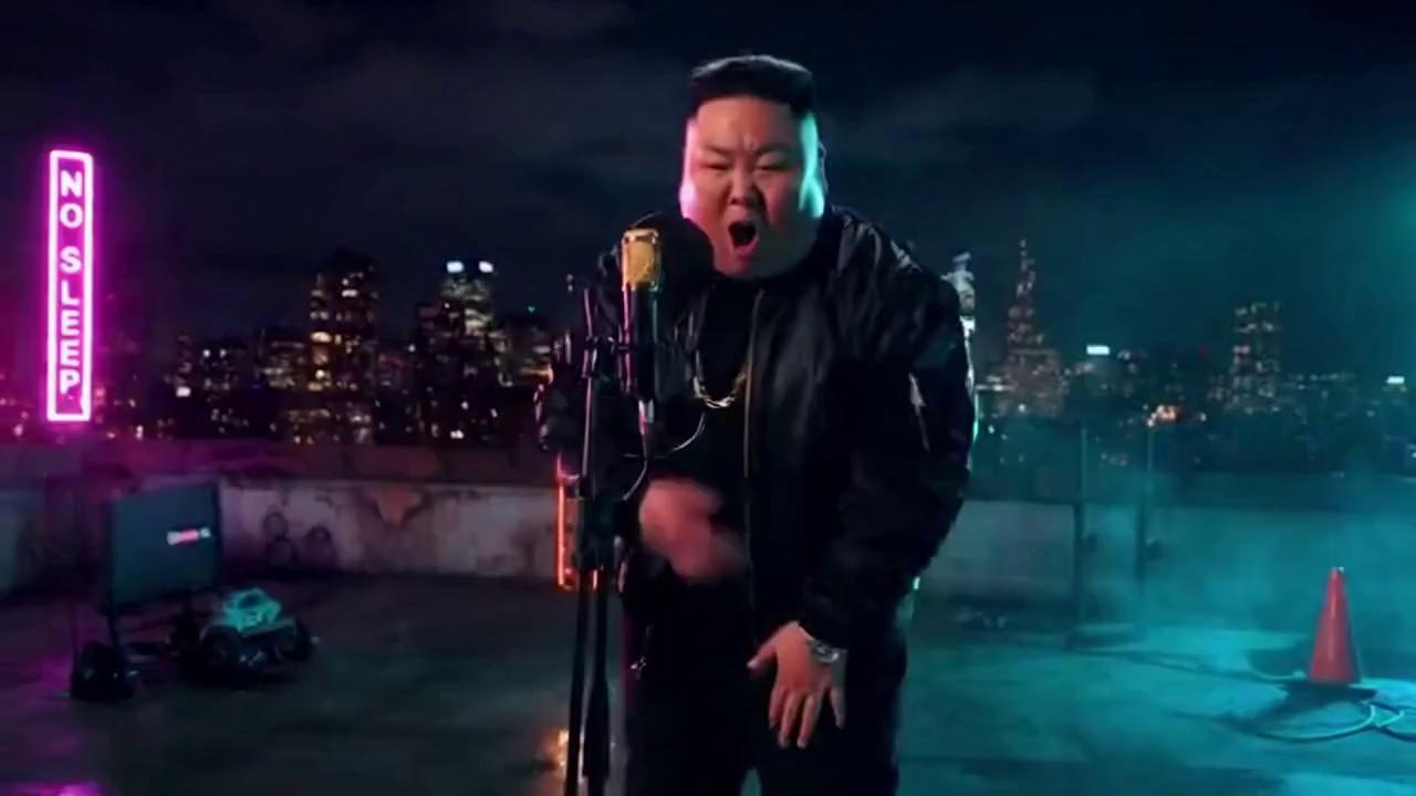 Prompt: “Create a 10-second vertical TikTok music video. Scene shows a caricatured fictional dictator-style character resembling a chubby East Asian man with a high fade haircut (NOT the real Kim Jong-un), performing on a gritty New York rooftop at night. Neon lights flicker, fog drifts through the skyline, and a hardcore New York trap beat shakes the scene. The character raps aggressively into a studio microphone on a stand, delivering the lyrics in sync:
‘All praise be to me the father of the land, making country bumpkins do handstands to please ya man, I’m the man on the wall they be praising me, in this country I’m bigger than Jesus or Gandhi.’
Use fast cuts, camera shakes, heavy bass reactivity, dramatic shadows, bold rim lighting, and exaggerated cartoonish swagger. Add animated lyric captions popping on screen in sync with the flow. Cinematic, high-contrast, music-video quality.”