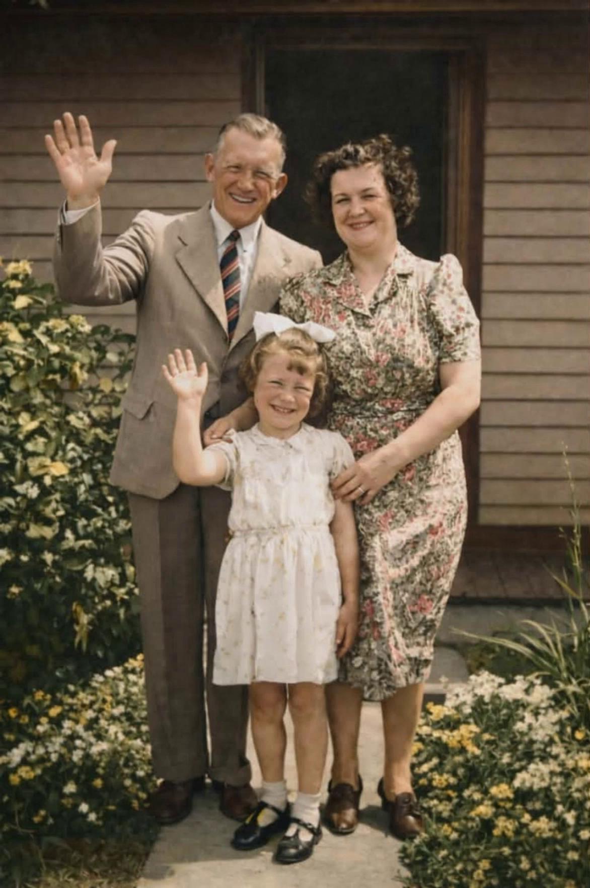 Prompt: Make the people wave to the camera