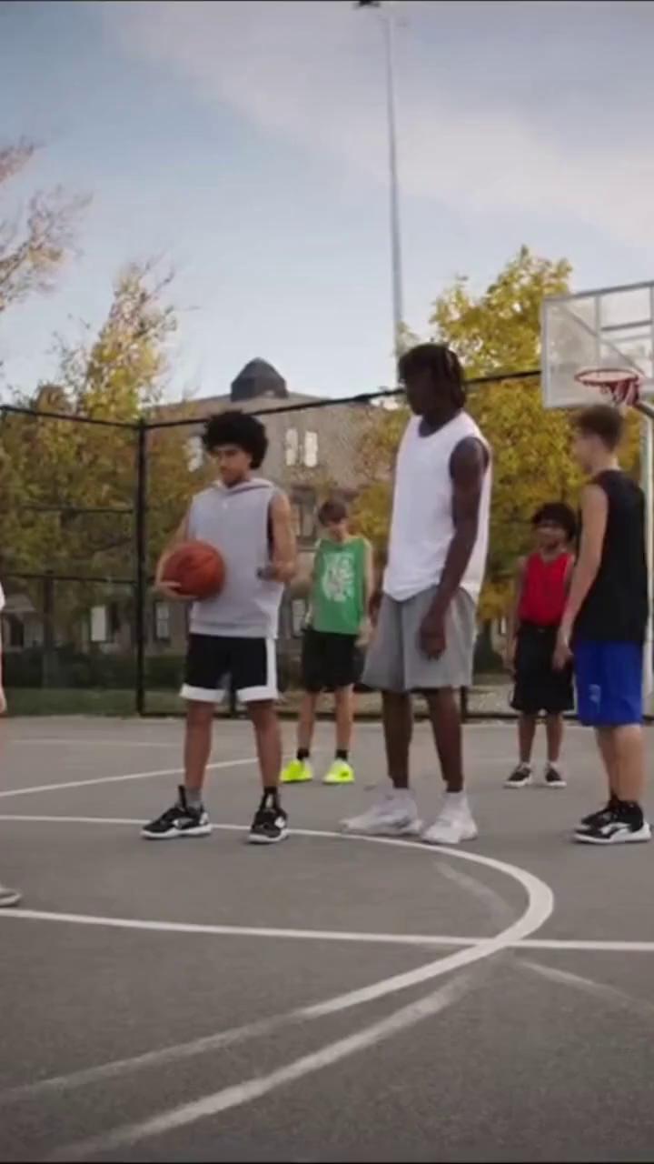 Prompt: The setting is a group of tall strong kids playing basket ball. A young nerdy kid with glasses goes up to them wanting to play. All the kids playing basket stop to stare at the nerdy kid. The scene changes to the nerdy kid on the floor as if he was beaten up.