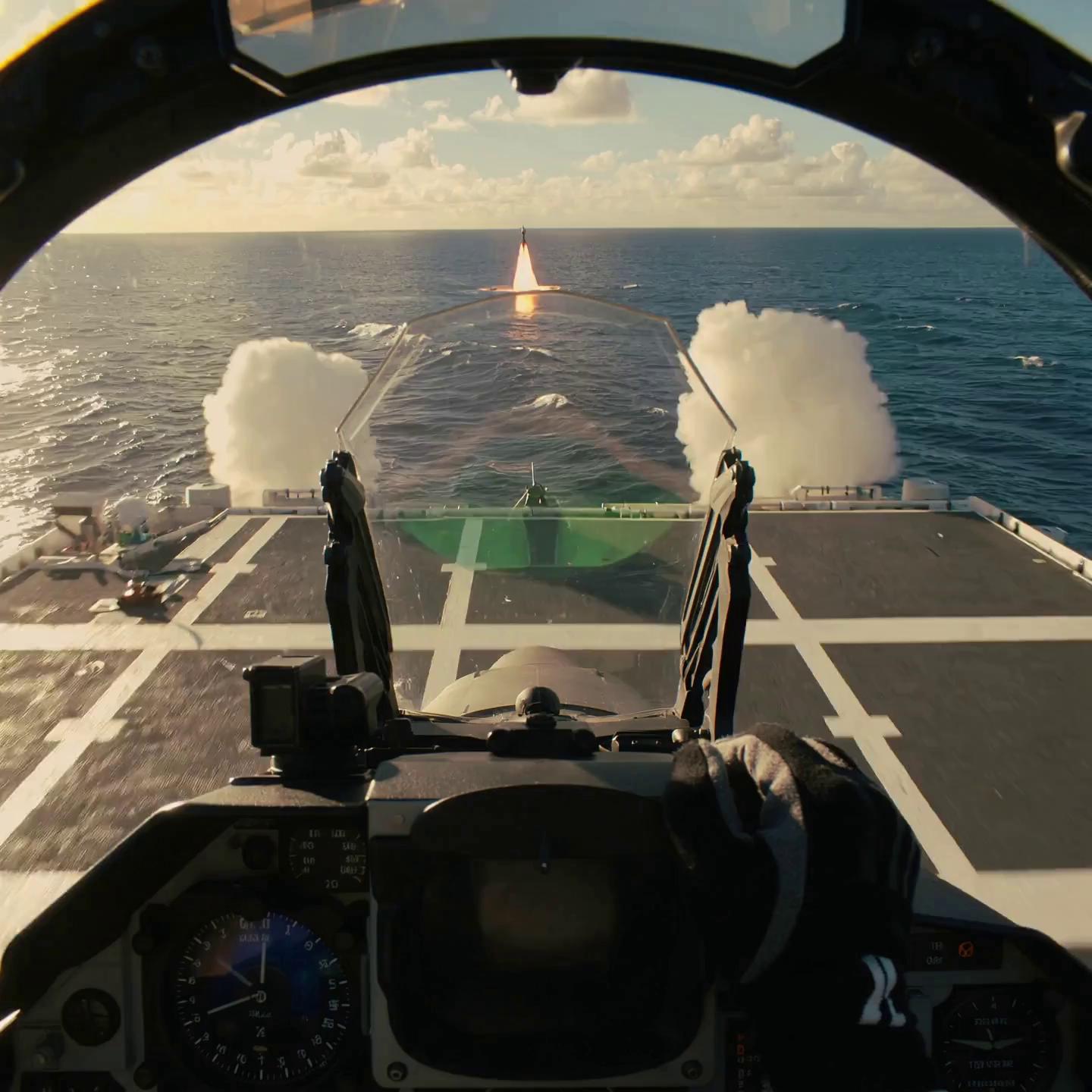 Prompt: Cockpit POV of an F-16 fighter jet taking off from an aircraft carrier at sunrise. The camera shows the pilot’s hands on the controls, the jet canopy reflections, and ocean waves rushing by below. Steam rises from the catapult as the jet launches powerfully into the air, afterburners glowing bright orange. The jet soars upward into the open sky, leaving a vapor trail behind. Ultra-realistic cinematic lighting, 4K detail, immersive sound of roaring jet engines.