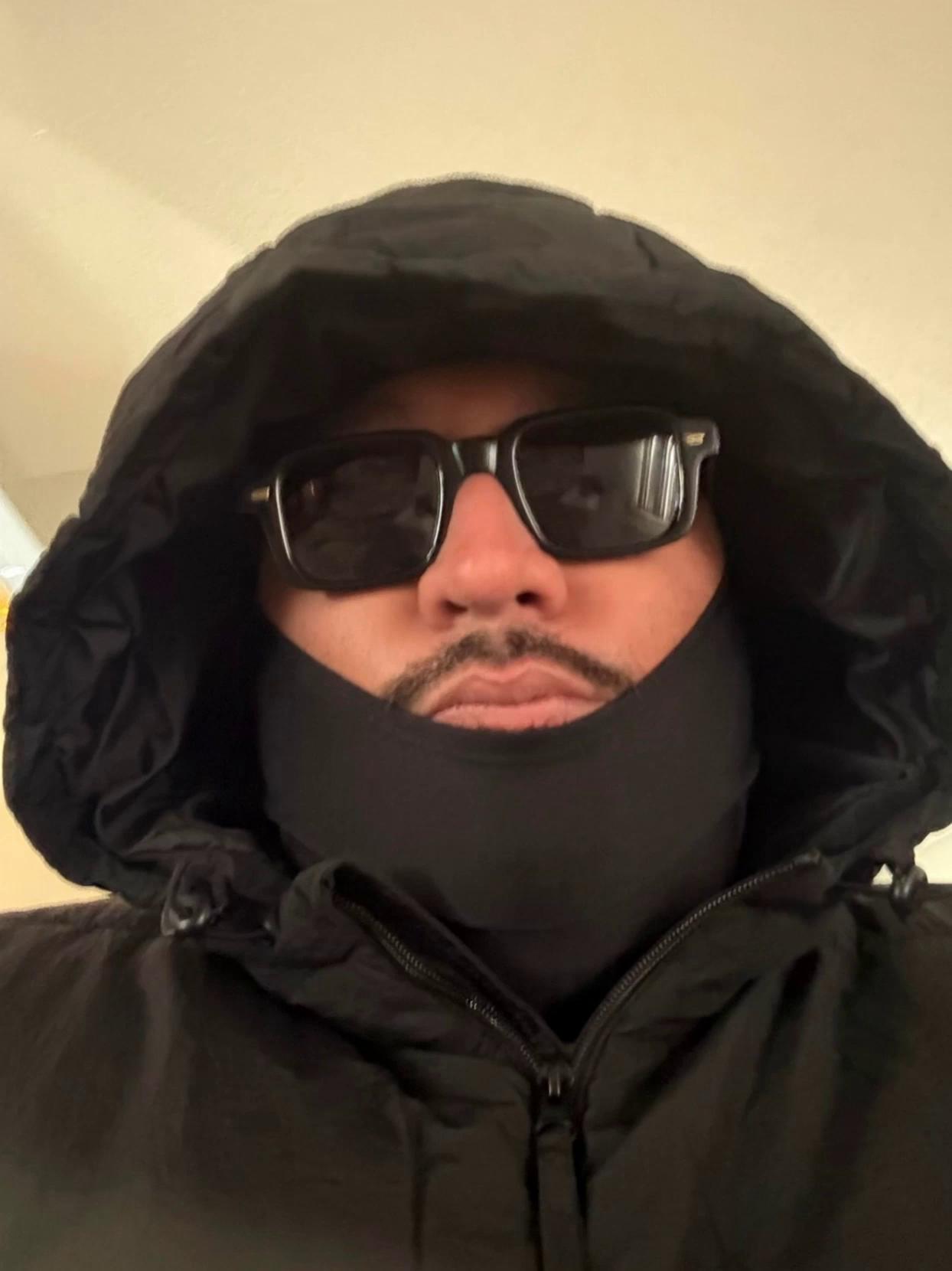 Prompt: Transform the provided image into a stylized 3D cartoon character version of the subject. The main character is at a vibrant, sunny beach, relaxing and interacting with a group of friends who are enjoying beach activities like playing volleyball, building sandcastles, or splashing in the water. The environment is colorful, energetic, and full of summer fun, with dynamic waves, animated palm trees, and bright cinematic lighting. Include expressive gestures, playful movements, and smooth character animations. Begin with the main character facing the camera, then smoothly transition into a slow 360-degree cinematic camera orbit around the group, capturing the lively interactions and beach activities. Maintain consistent character proportions and facial features throughout. Animation is smooth, expressive, and stylized — not realistic. High-quality 3D cartoon rendering, clean textures, Pixar-meets-hip-hop animation style, professional animated video quality.