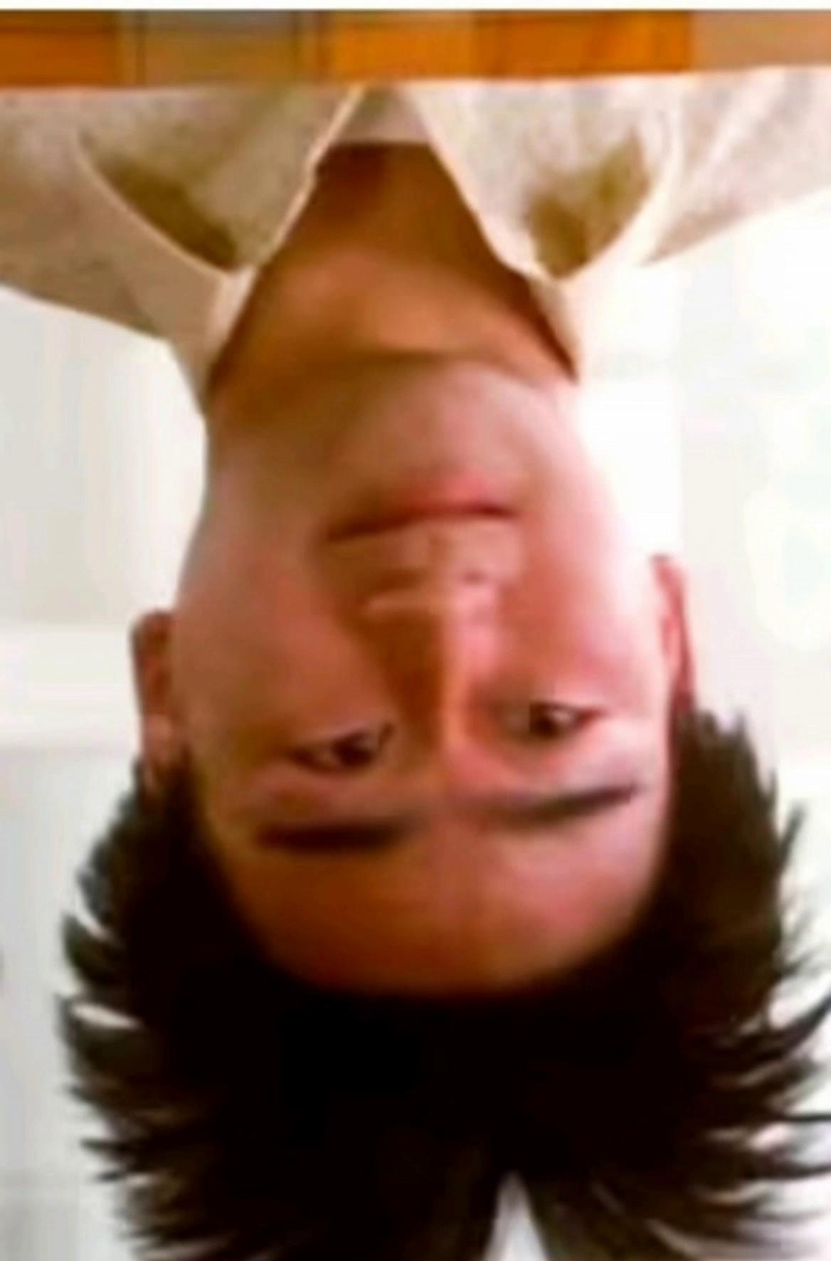 Prompt: Subject smiles and says in english with slight Chinese accent he says"Party with long duckdong at Evil Olive!" Then falls down south out of frame laughing.  