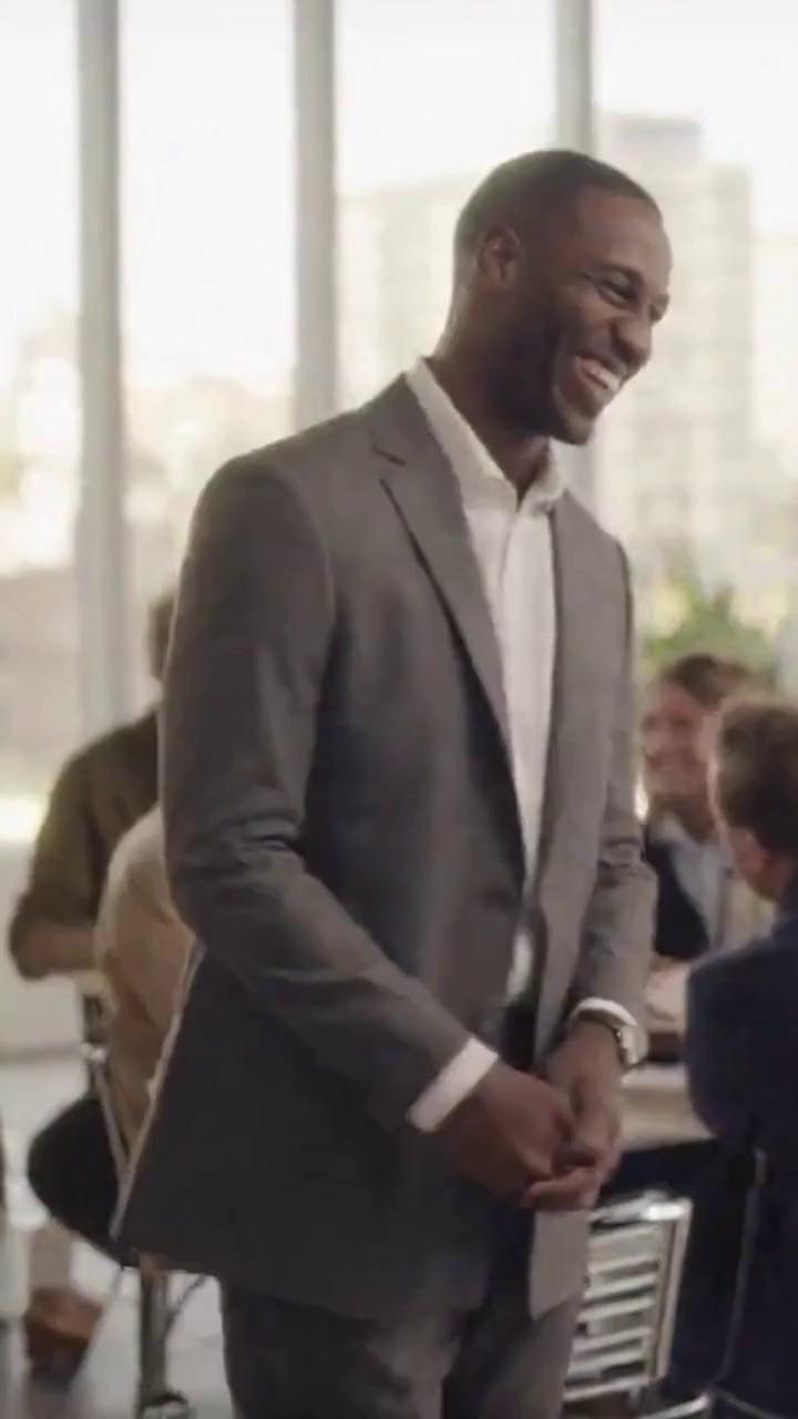 Prompt: Create a cinematic 12-second vertical video (9:16).
Scene opens in bright daylight inside a modern office or café. A well-dressed professional confidently smiles, laughs, and chats with colleagues or friends. Everyone appears positive, energetic, and productive. The main character looks successful, relaxed, and happy.

Quick cut transition.

The same character enters an elevator, empty hallway, or quiet car. The environment becomes silent and slightly cooler in lighting. As the doors close or they sit alone, their smile slowly fades. Their shoulders drop. Their eyes show exhaustion, anxiety, or emotional weight. They take a deep breath or close their eyes, revealing inner struggle that was hidden moments ago.

End on a still, emotionally resonant frame showing vulnerability and authenticity. No dialogue or text overlays. Natural facial expressions, realistic motion, cinematic lighting, soft depth of field, emotional realism, professional film quality.