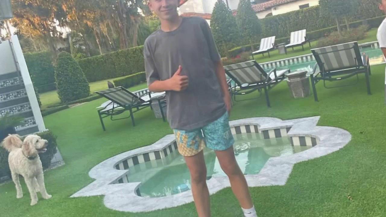 Prompt: make him do a backflip into the pool and then fly away