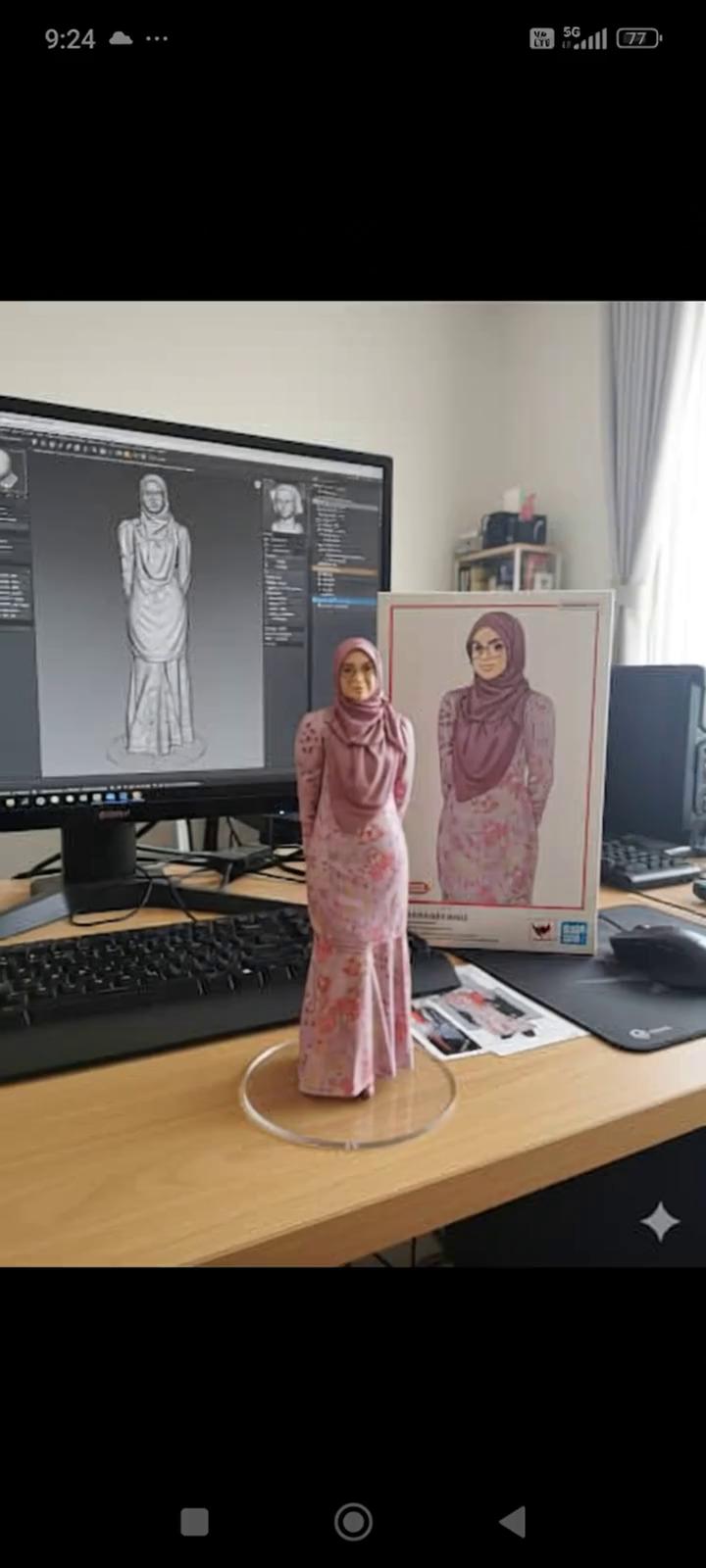 Prompt: Nure two hand gently pick up the figure on the frame and rotate it slightly for inpection.the model in the packaging box remain stationary,while all other background elements stay unchanged