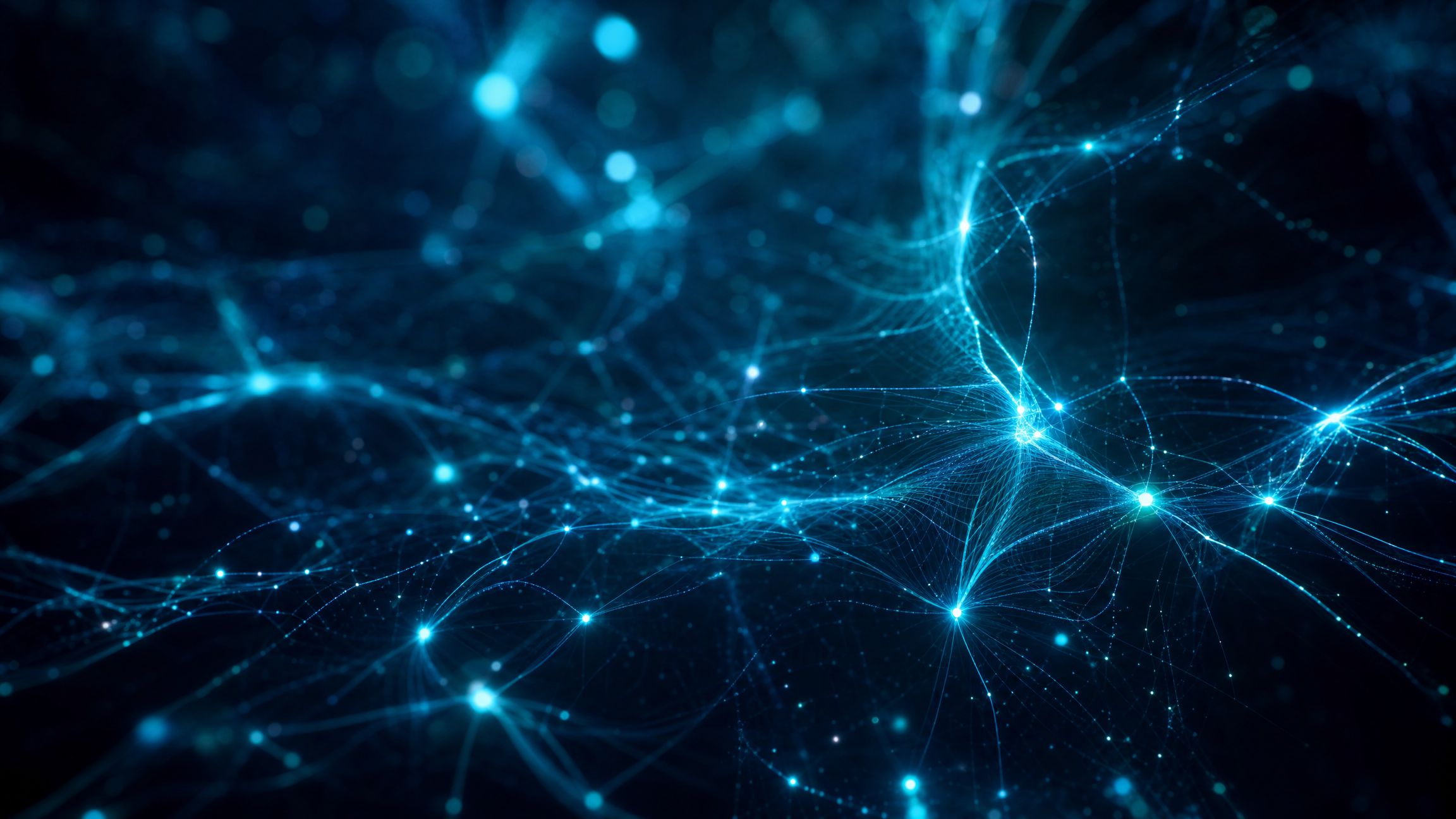 AI-powered workspace — laptop with teal data visualisation