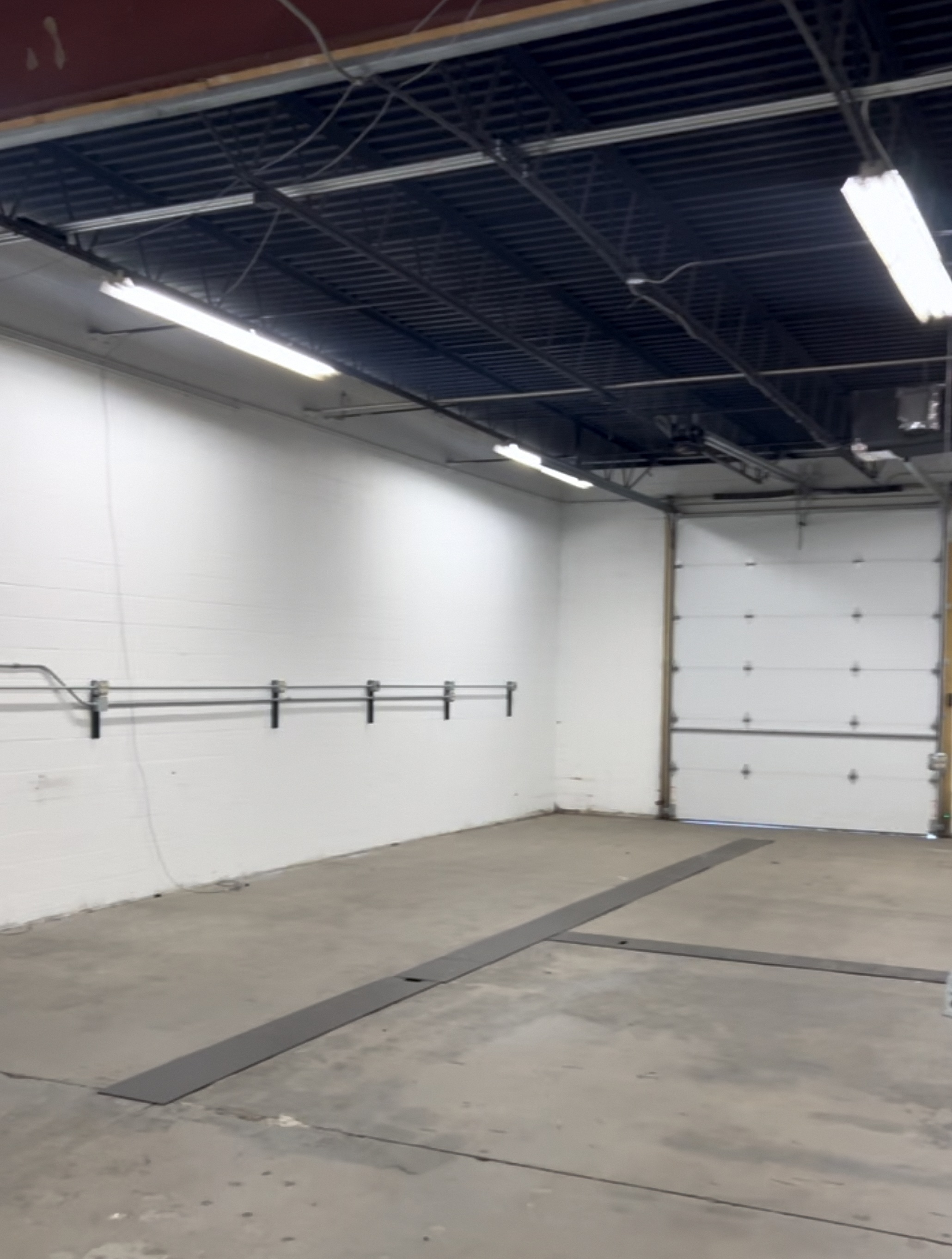 Garage bay at The Gloss Spot detail shop in Champaign IL