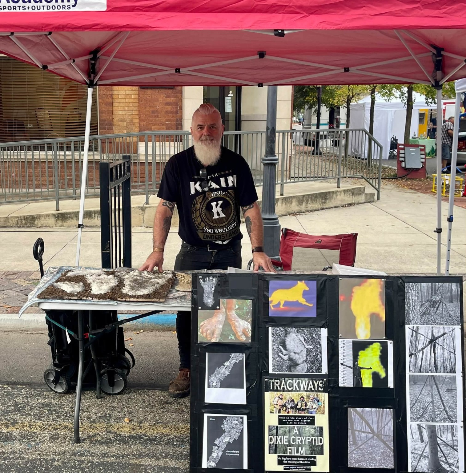Ohio Cryptid Researcher booth with research displays and footprint casts at NBF 2026