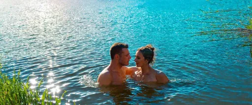 Prompt: (serene scene) a man and woman skinnydipping in a tranquil lake, vibrant blue sky overhead, gentle ripples on still water, sun reflecting off the surface, peaceful ambiance, warm sunlight illuminating the surroundings, lush greenery framing the lake, carefree expressions, connecting with nature, high-quality (4K) resolution, inviting, relaxing atmosphere.