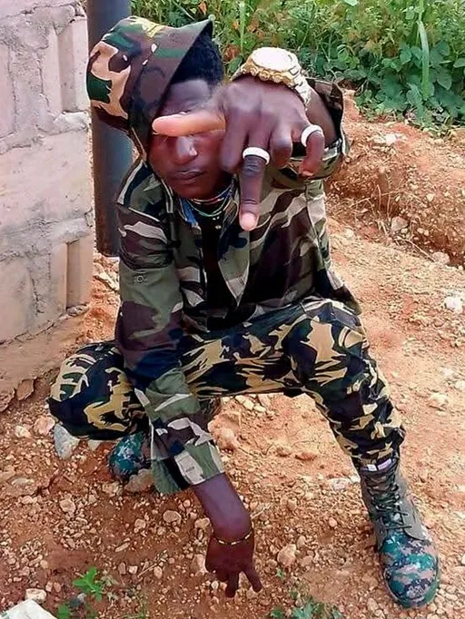 Prompt: Young african american man wearing army uniform ALi 