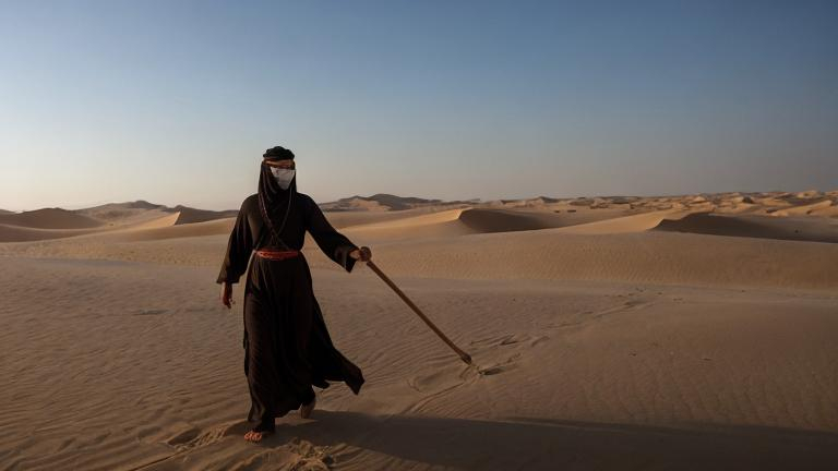 Prompt: An Arab mystic.  walking on the desert sand.  carrying a stick.  face shrouded in light.  Ancient Arabic.  Mysterious essence.