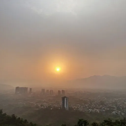 Prompt: a sunrise in pune city, mountains are visible and the morning is misty
