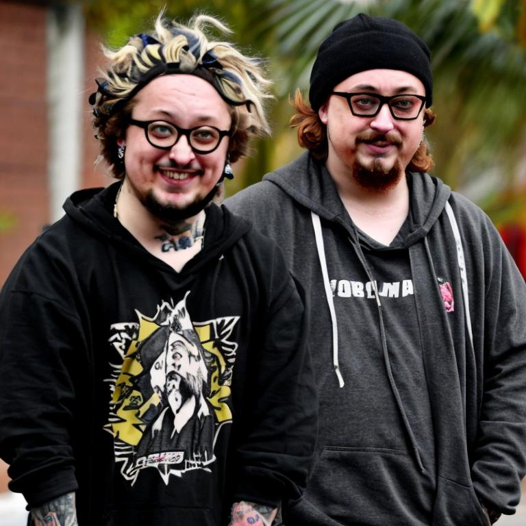 Prompt: Sam hyde version of Lil peep half blond hair dye, half black air dye, Lots of tattoos All over Like a stupid amount of Dumb tattoos