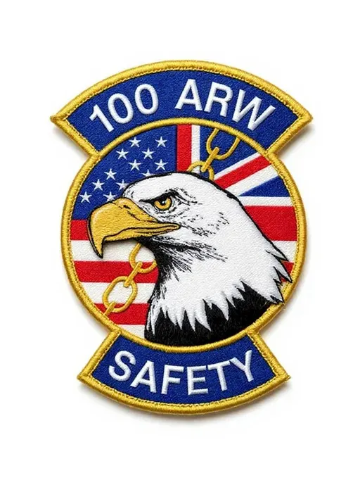 Prompt: Using this as a reference, make the flags more evenly divided. Make the top rocker say 100 ARW and the bottom will say 
SAFETY, remove the text that is there now  utilize the image I sent as reference, make  the eagle fit better into the patch 