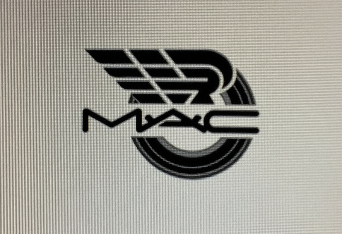 Prompt: A sleek, bold logo features the letters "MAC" prominently in a modern typeface, accompanied by an artistic wing design that suggests motion or speed. The wing element conveys a sense of dynamism, while the circular outline resembles a tire, hinting at an automotive or transportation theme. The entire design is rendered in black against a light background, lending it a striking contrast and a contemporary feel. Overall, this logo encapsulates energy and innovation, making it visually compelling and memorable.