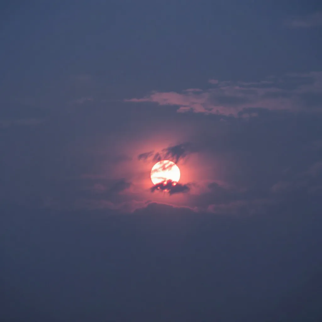 Prompt: make a photo of a dim sun in the sky