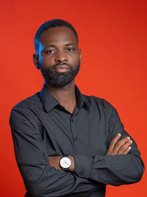 Prompt: Using the attached selfie as an exact reference, generate high resolution professional headshot that preserves 100% of my facial features, including face shape, hair, skin tone and expression. Apply studio quality lighting and a soft neutral background and adjust my attire to formal professional wear ensuring the image exudes confidence and approachability for a LinkedIn profile