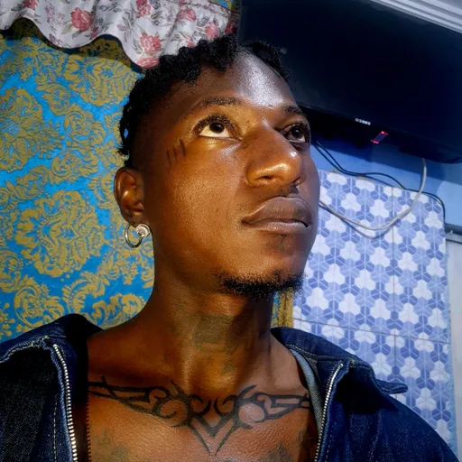 Prompt: ALi Boubacar Chest Tribal Tattoo images