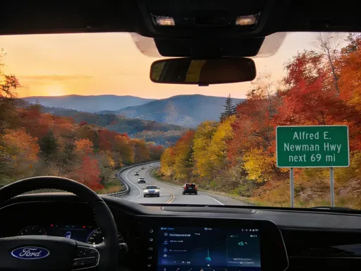 Prompt: change text of sign to centered txt "Alfred E. Newman Hwy
next 69 mi", make color of sign highway sign green

