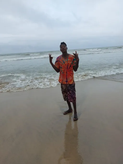 Prompt: ALi Boubacar enjoy on the beach beach beach beach beach