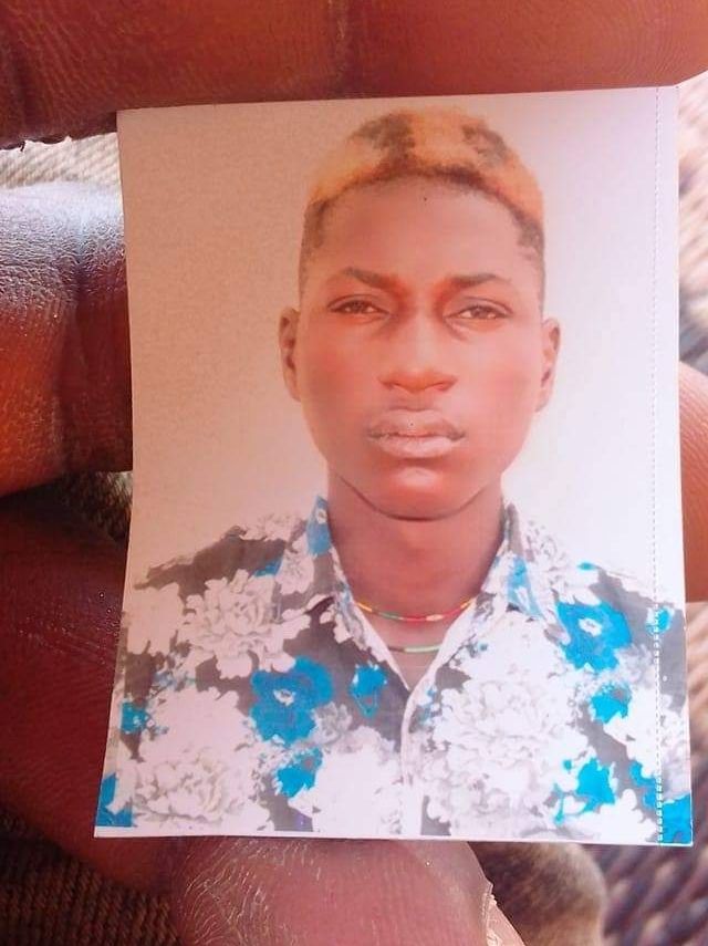 Prompt: ALi Boubacar he had multicoloured hair 