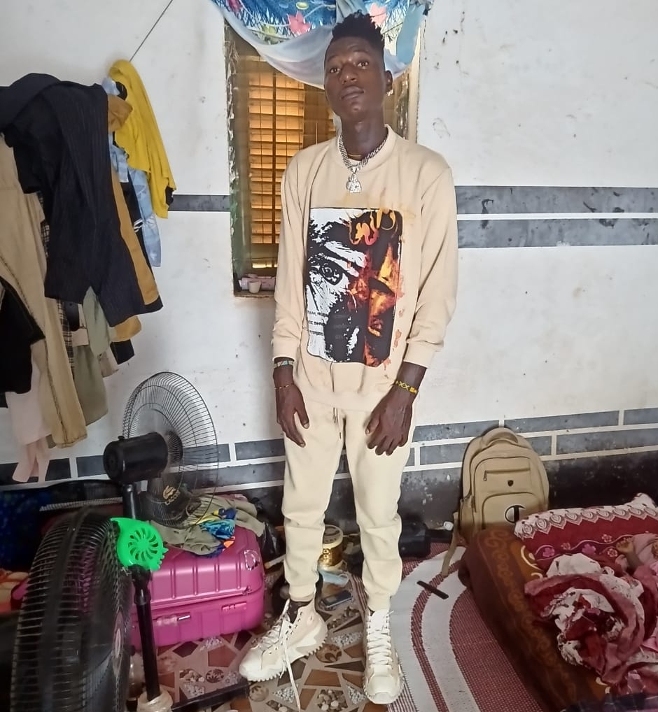 Prompt: ALi Boubacar dons head to toe white attire after leaving meeting 