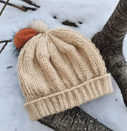 Prompt: knitted beanie in the fall 

