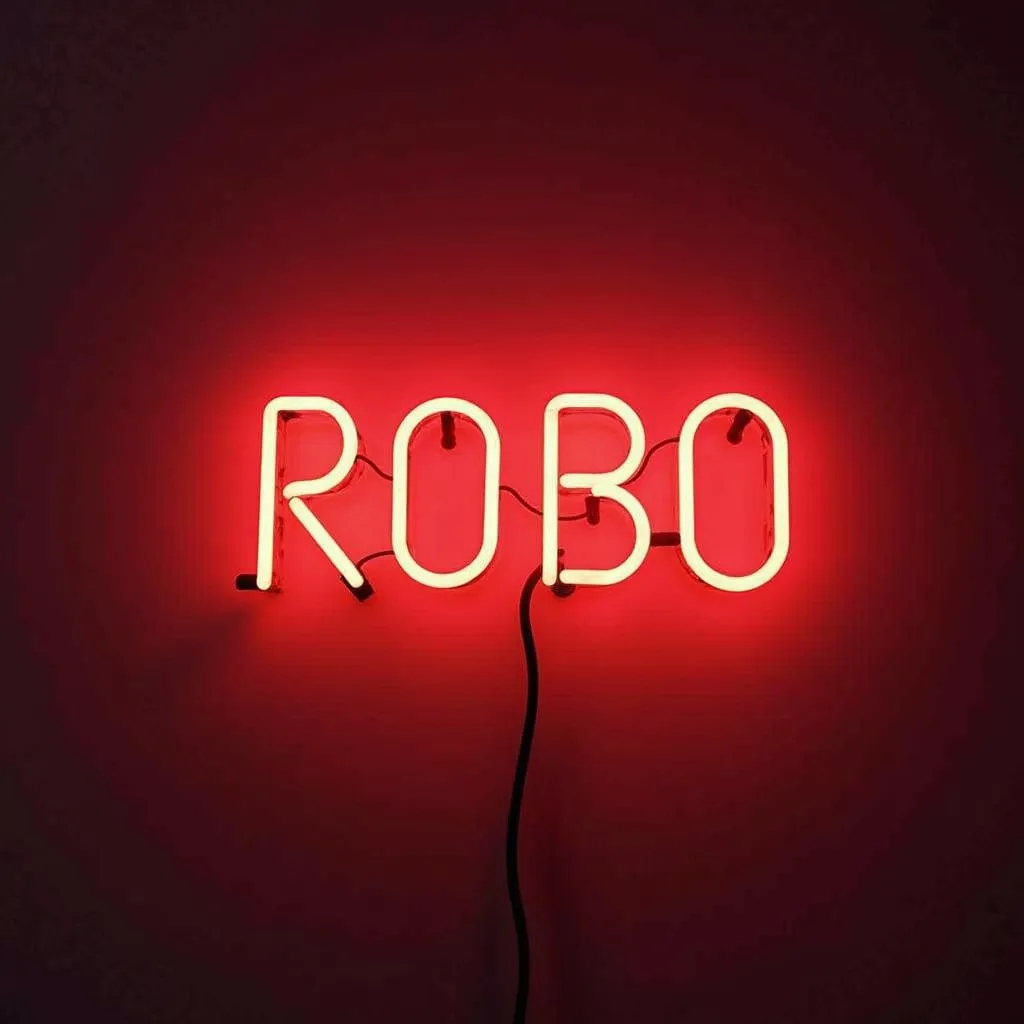 Prompt: a neon sign that  writes ROBO