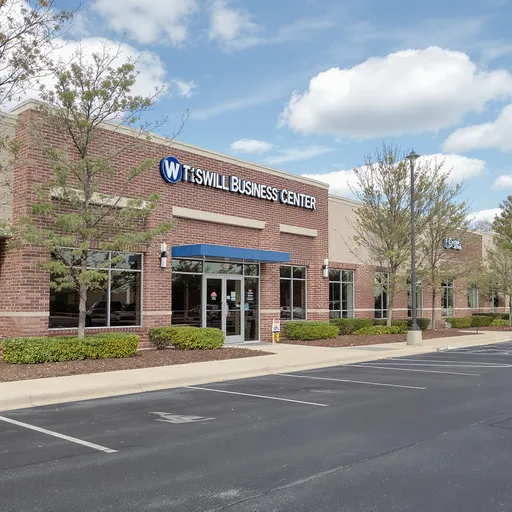 Prompt: Roswell Business Center is across the street from Wellstar North Fulton Medical Center, which makes it a perfect location for medical offices, flex warehouse and research & development.  The buildings are brick on block construction with glass entrances.  Some suites can be modified to an open floor plan with 14' ceiling height and access to a dock high or drive-in door.  
Some of the allowed uses under current zoning: medical, light 