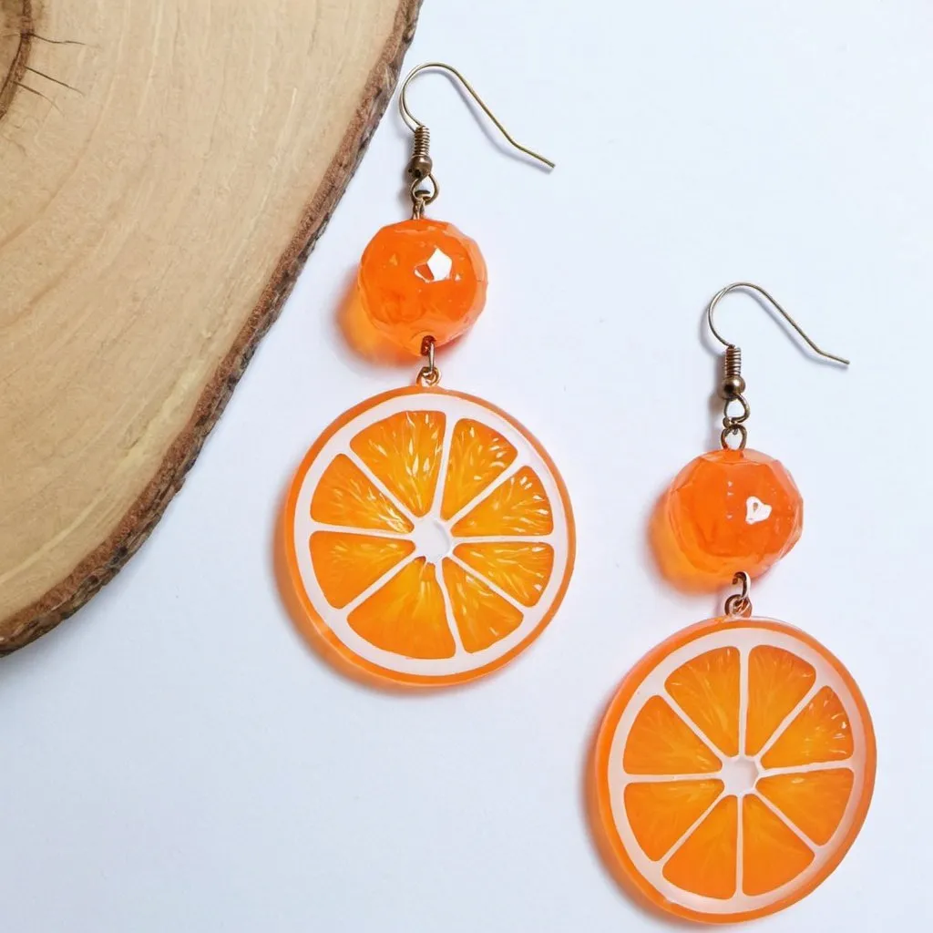 Prompt: generate resin orange fruit slice dangle earrings 