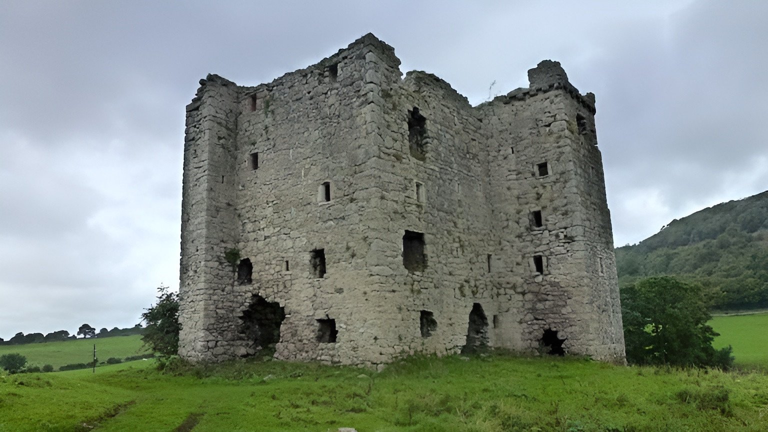 Prompt: Arnside Tower, ancient stone construction, medieval architecture, lush green surroundings, historical landmark, high quality, realistic, natural lighting, earthy tones