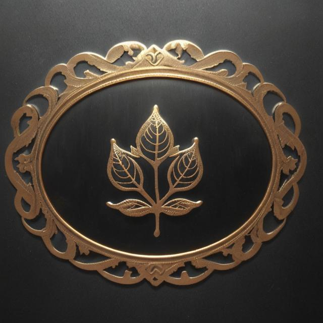 Prompt: 1880s style gold filigree scroll work leaves in an oval shape etched into a blackened steel surface. The pattern appears to be based on stylized oak leaves, with seed cones in the design.